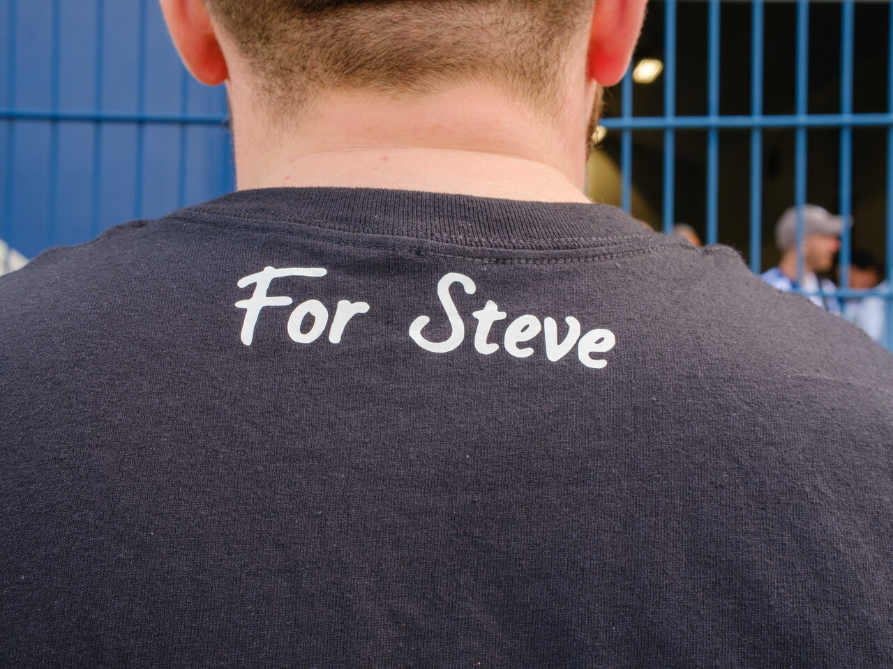 Close-up of the back of Moore Than Cancer team t-shirt displaying "For Steve"