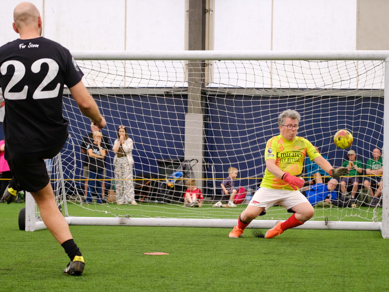 Moore than Cancer player striking his penalty with Arsenal goalkeeper comes close saving it.