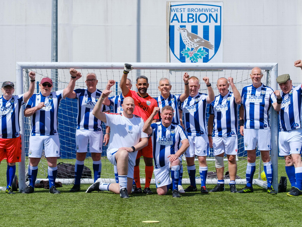 Cancer Kickers 1 team photo in front of the goal.
