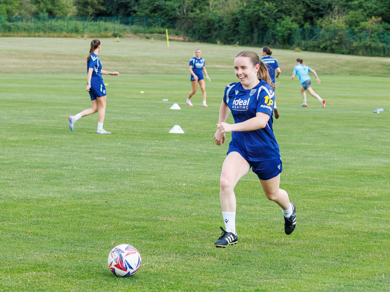 Ella Haughey running with the ball during a training session