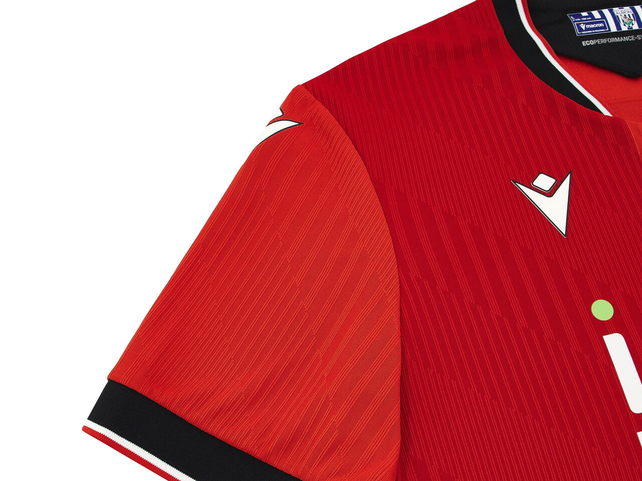 An image of a small detail on Albion's 2026/27 red away kit 