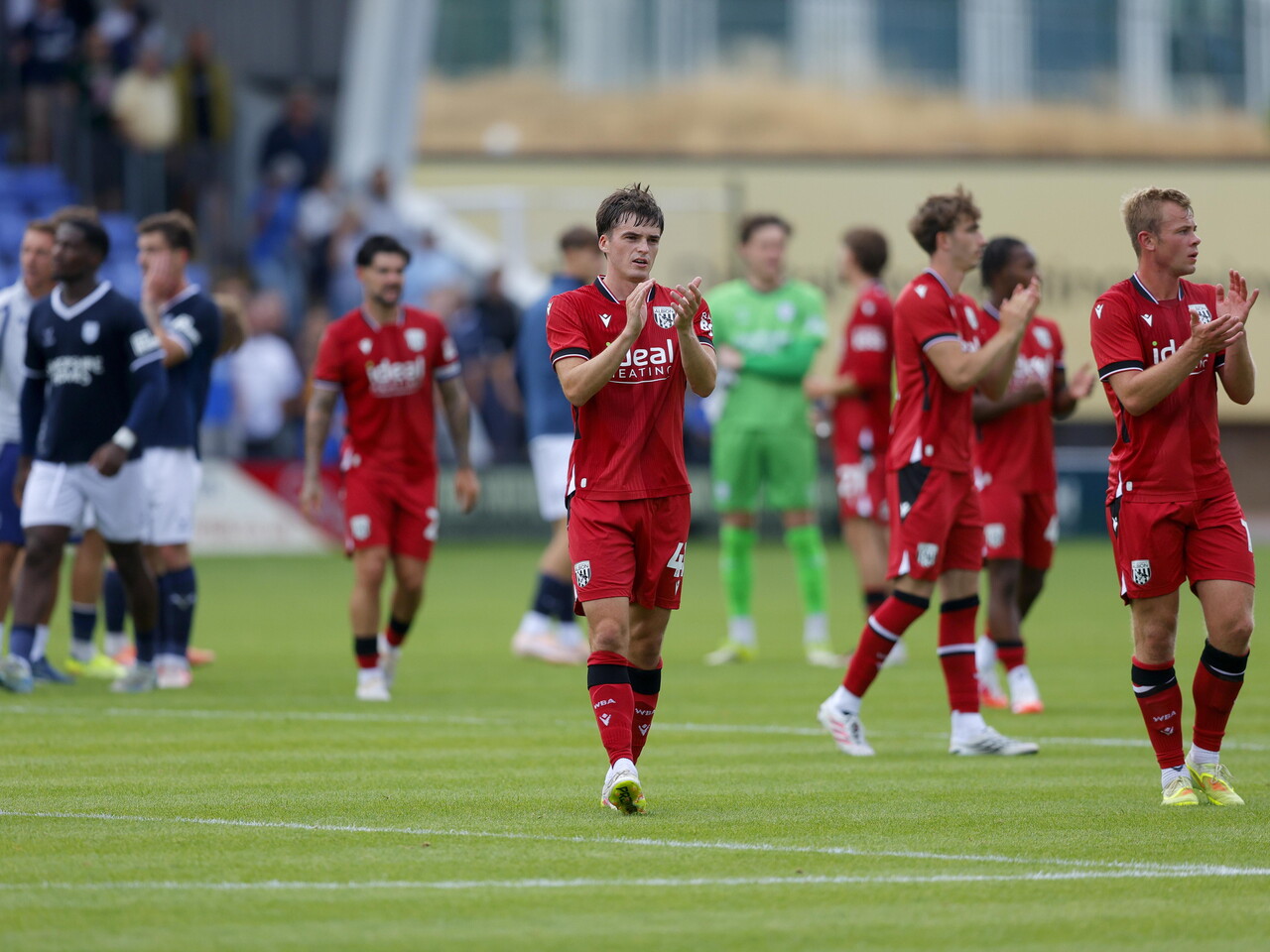 Alex Williams applauds the fans after the game