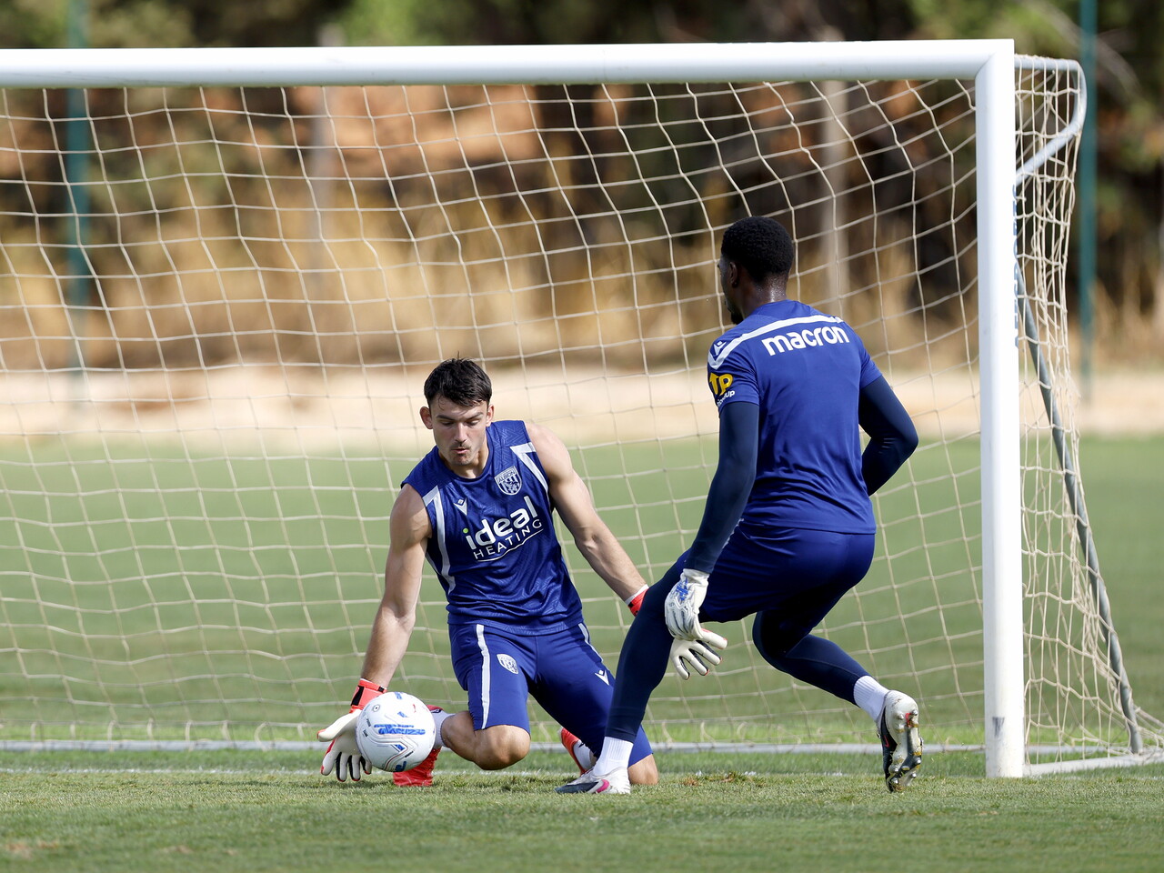 Max O'Leary making a save during a training session