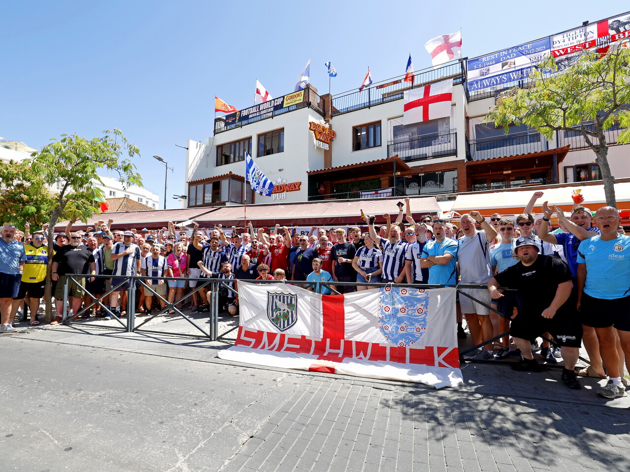 A general view of several WBA fans in a bar in Portugal 