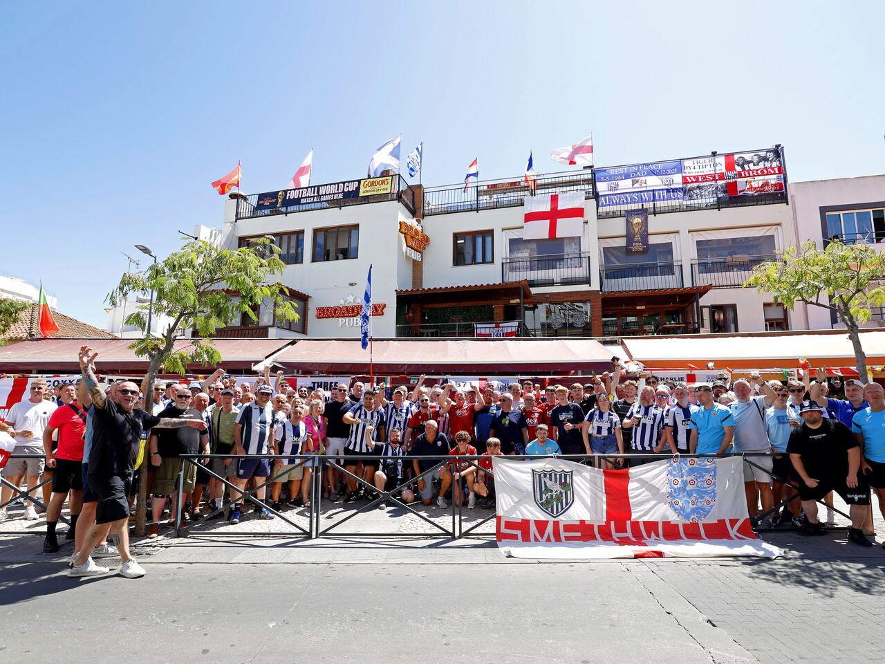A general view of several WBA fans in a bar in Portugal 