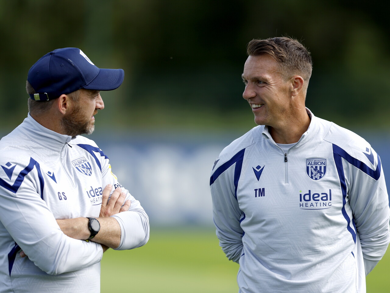 Albion coaches Gavin Strachan and Tony McMahon chatting during a training session