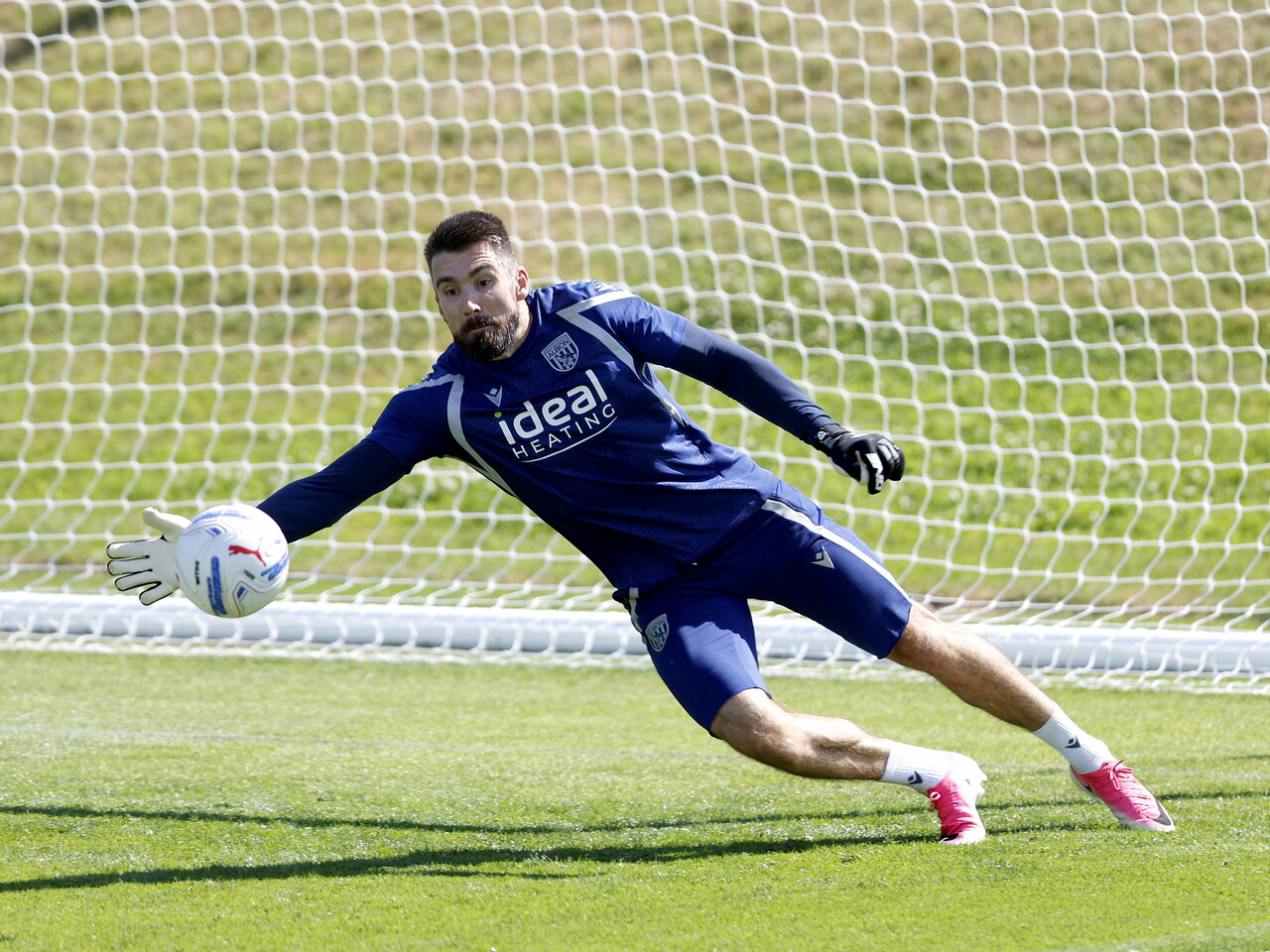 Matt Ingram making a save in training 