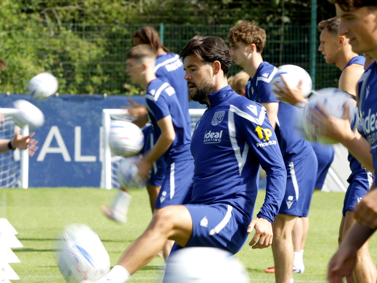 Alex Mowatt on the ball during a training session 