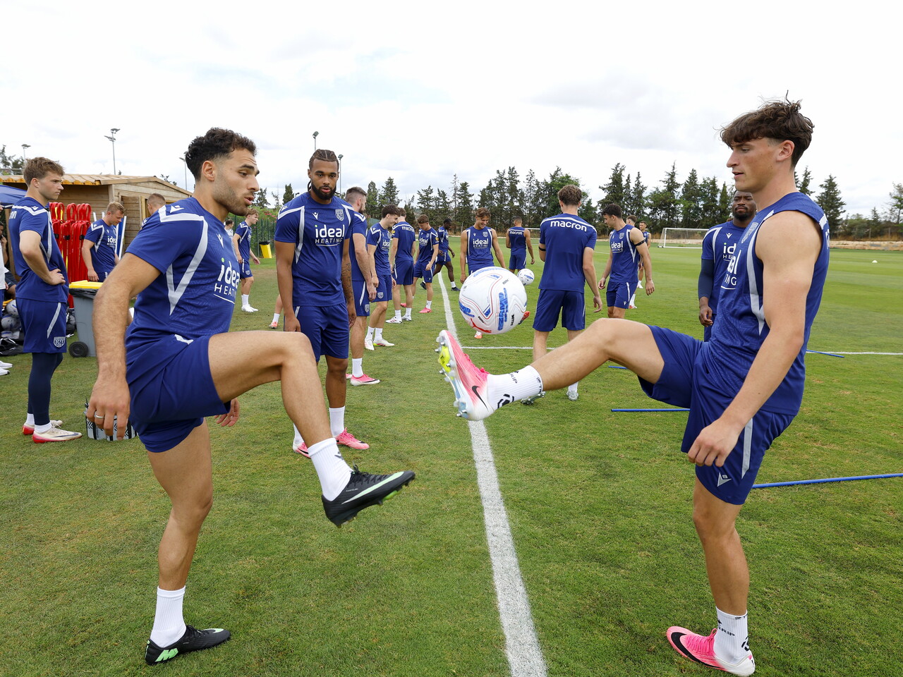 Tammer Bany and Barney Stewart on the training pitch in Portugal