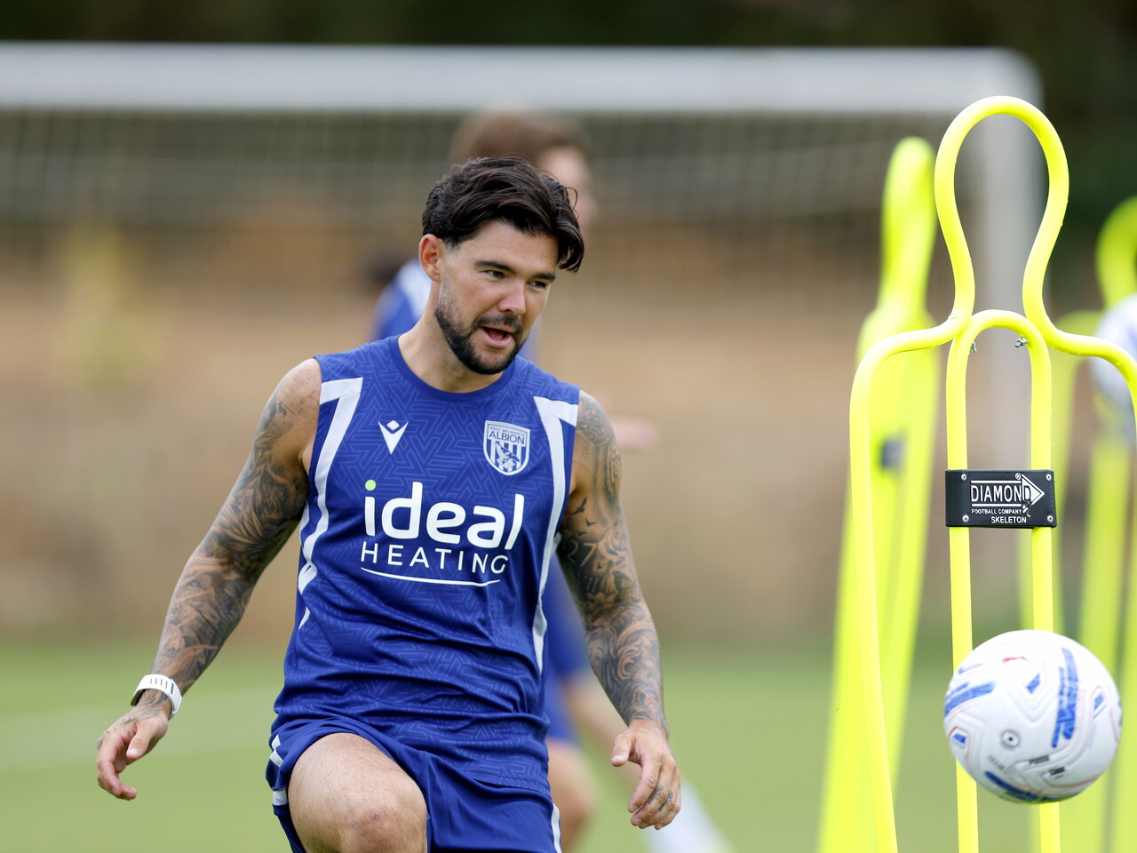 Alex Mowatt on the training pitch in Portugal