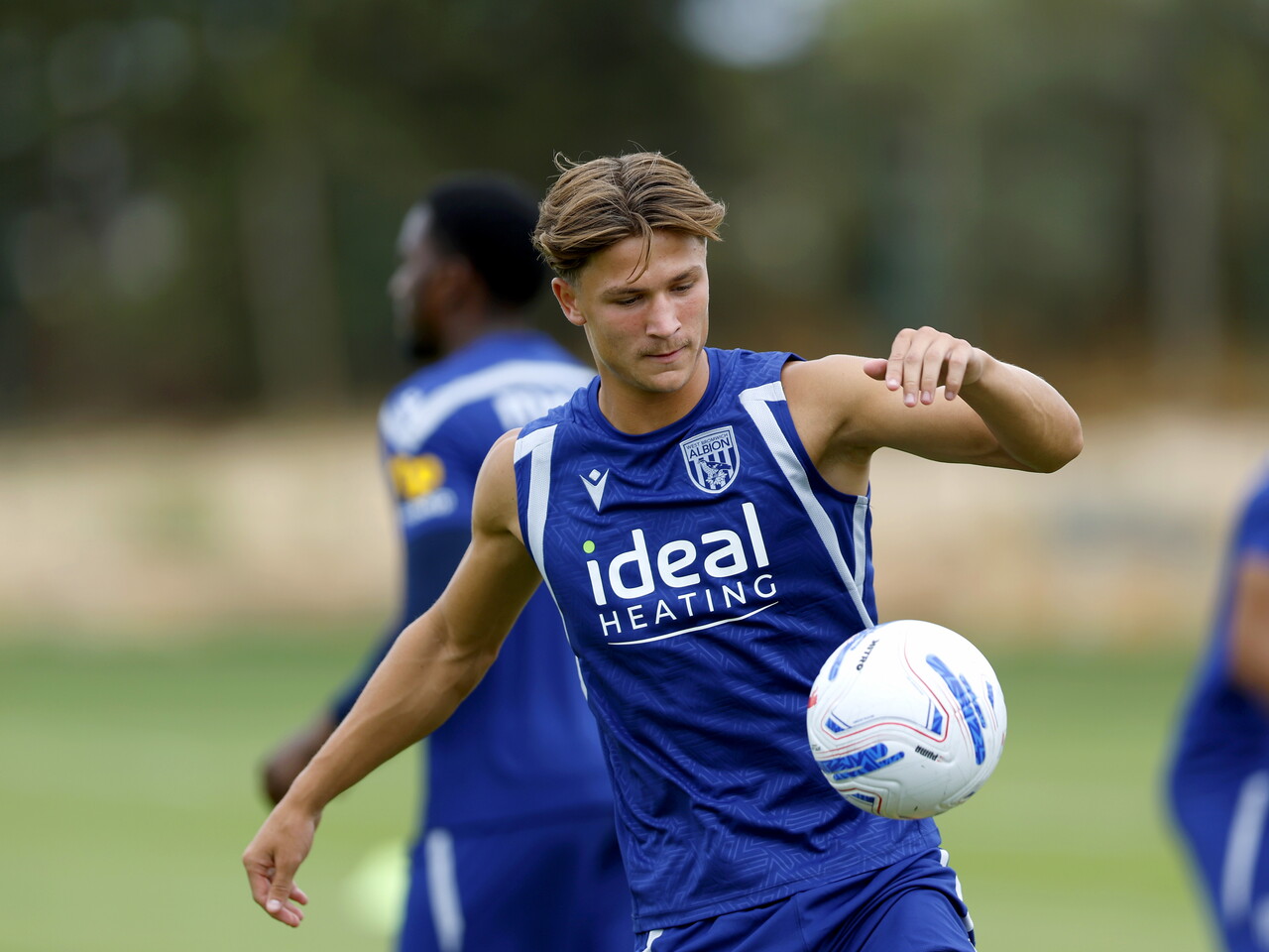 Cole Deeming on the training pitch in Portugal