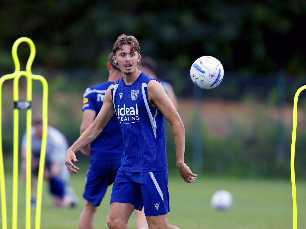 Isaac Price on the training pitch in Portugal