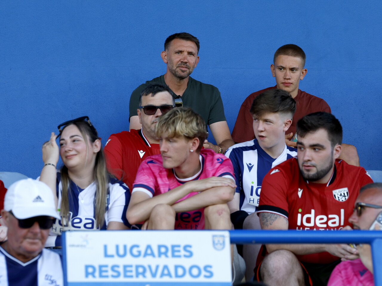 Gareth McAuley in the stand with WBA fans watching the game against Bromley 
