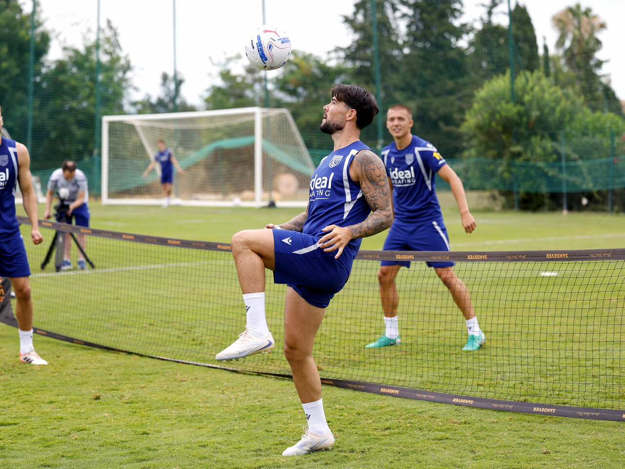 Alex Mowatt plays foot tennis in Portugal