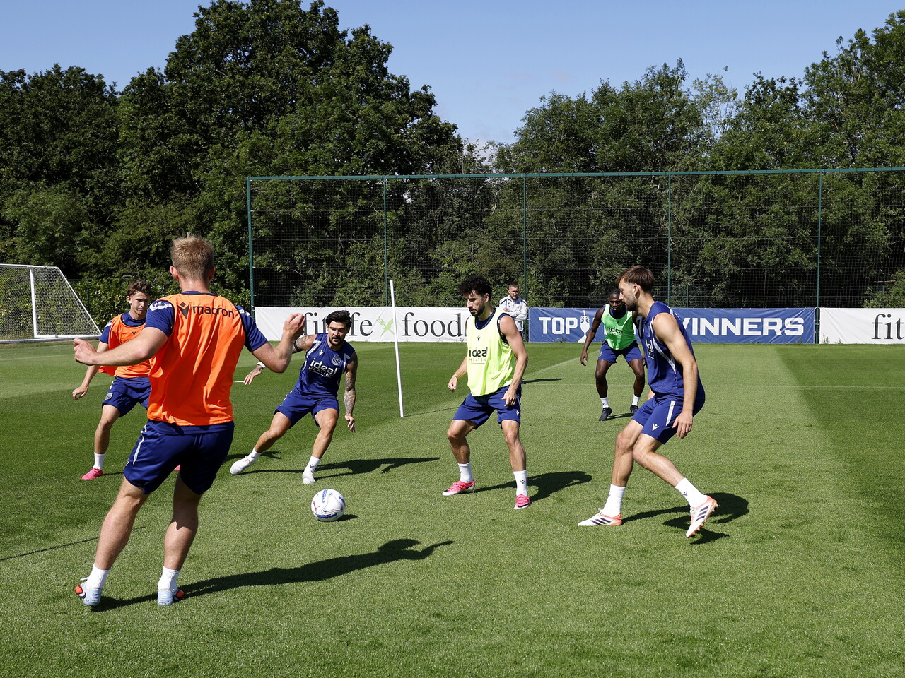 Several Albion players taking part in a possession drill during training 