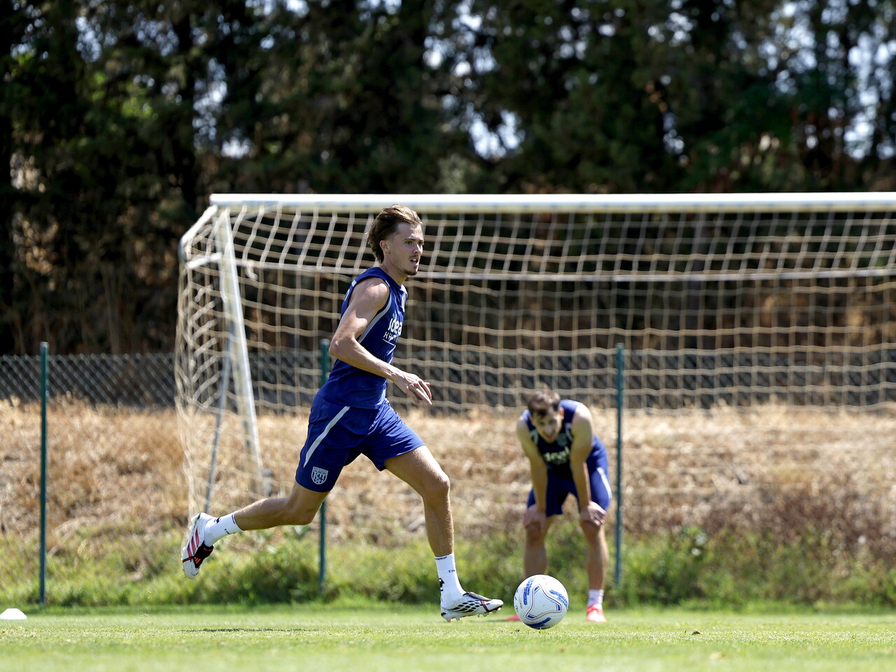 Isaac Price on the ball during a training session