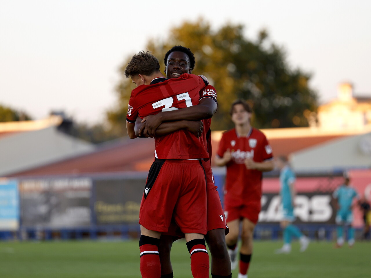 Jack Bray celebrates with Souleyman Mandey after scoring against Bromley