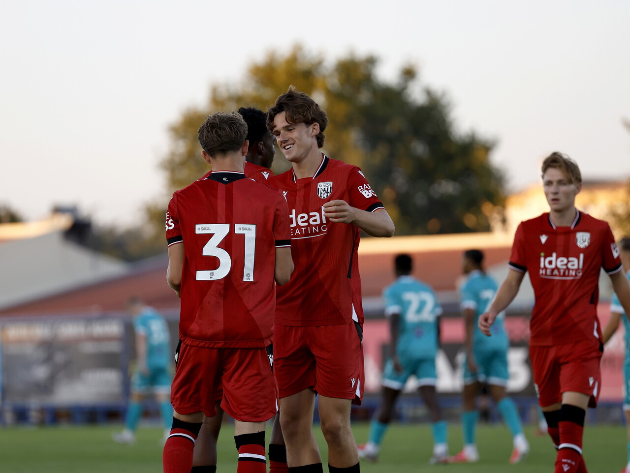 Jack Bray celebrates with Matty Crowther after scoring against Bromley