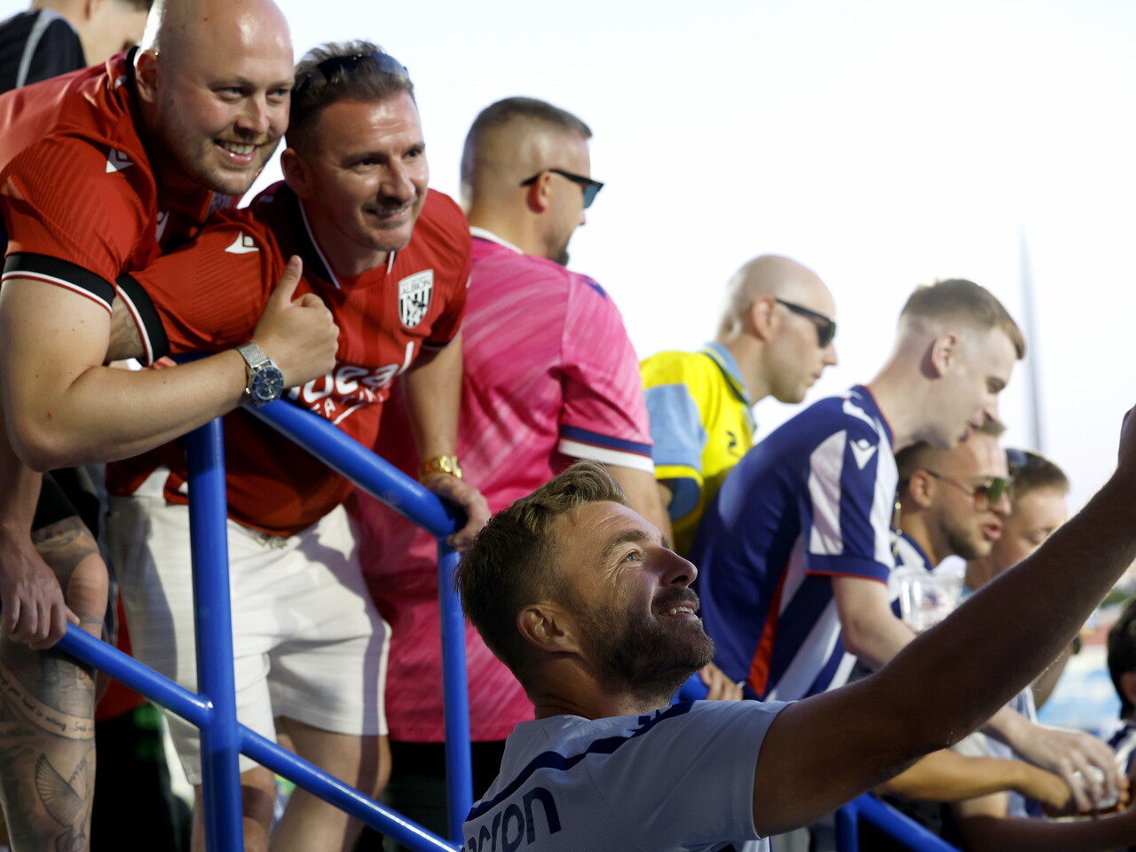 James Morrison taking a selfie with WBA fans 