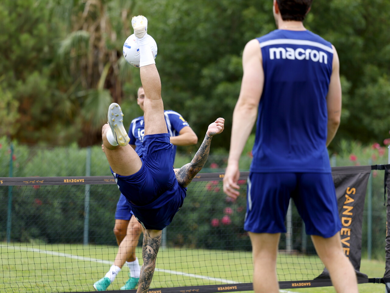 A WBA player doing an overhead kick during a training session