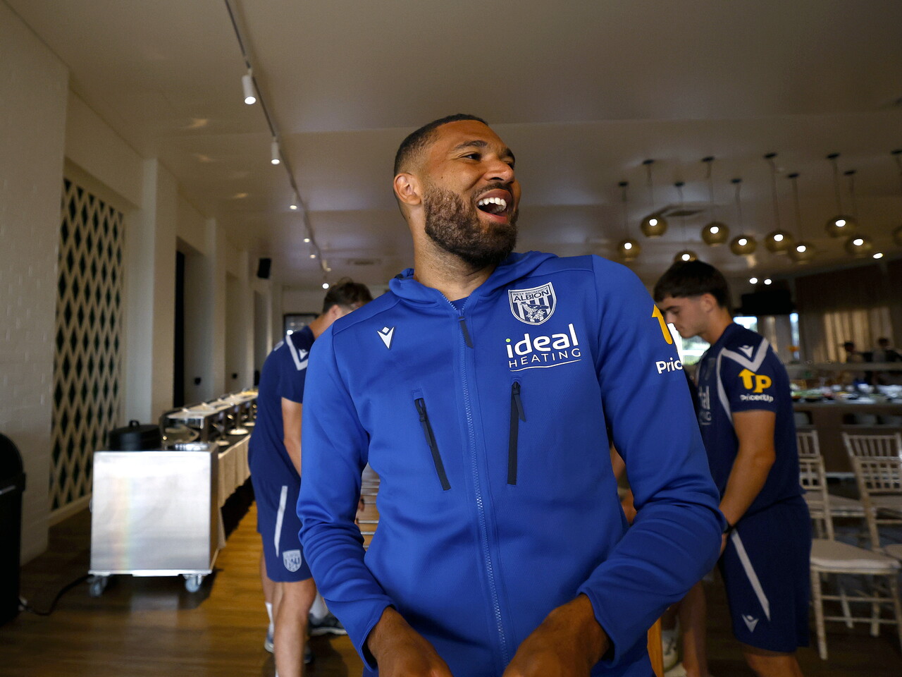 George Campbell laughing 