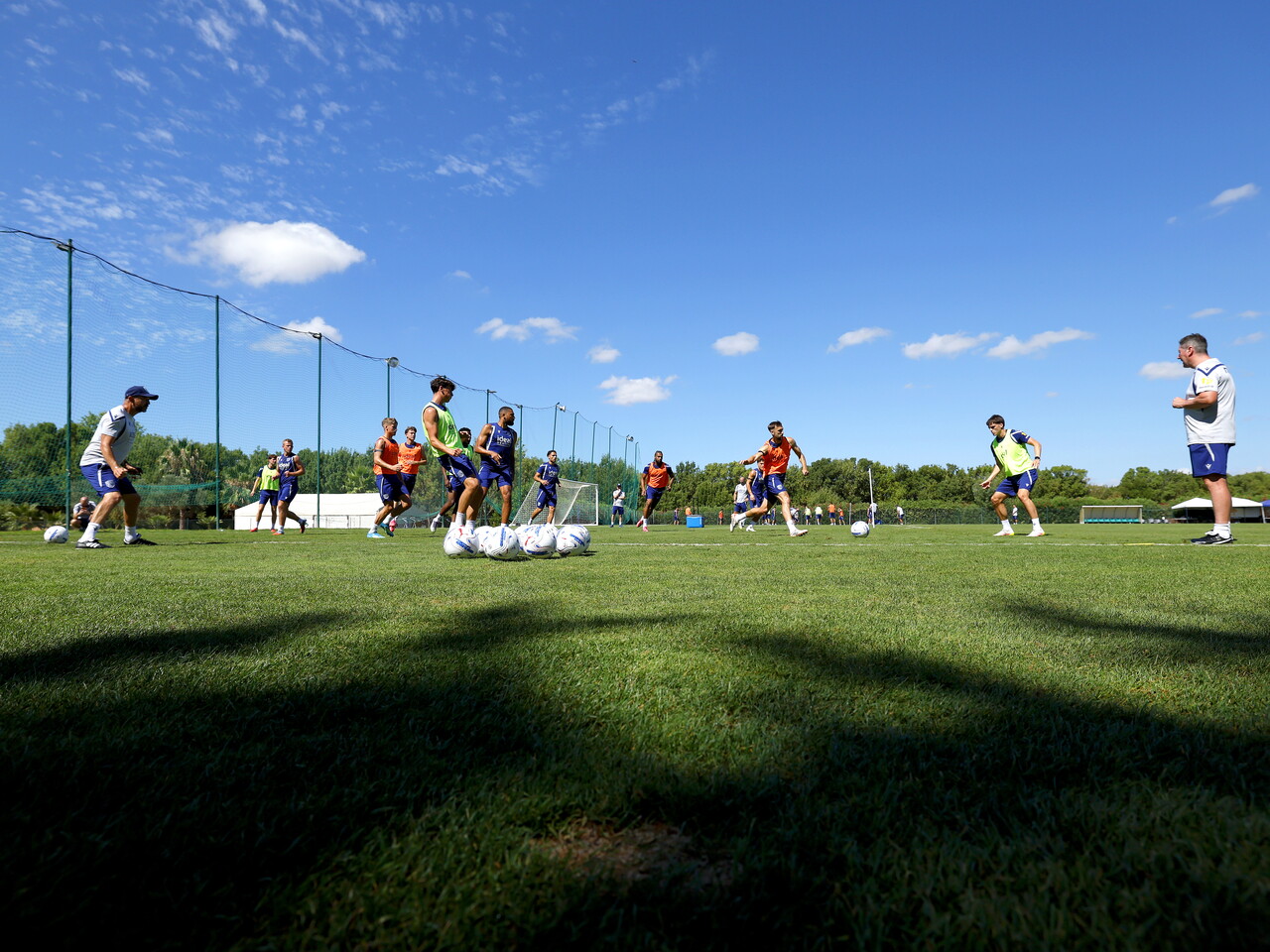 A general shot of a training session with several players involved in a drill