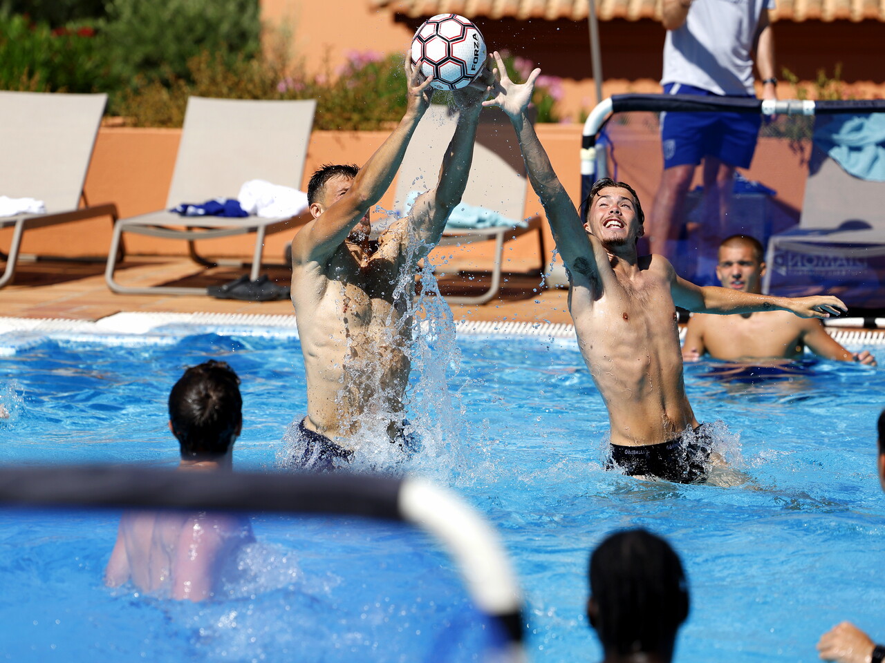 Several WBA players in the pool during a game