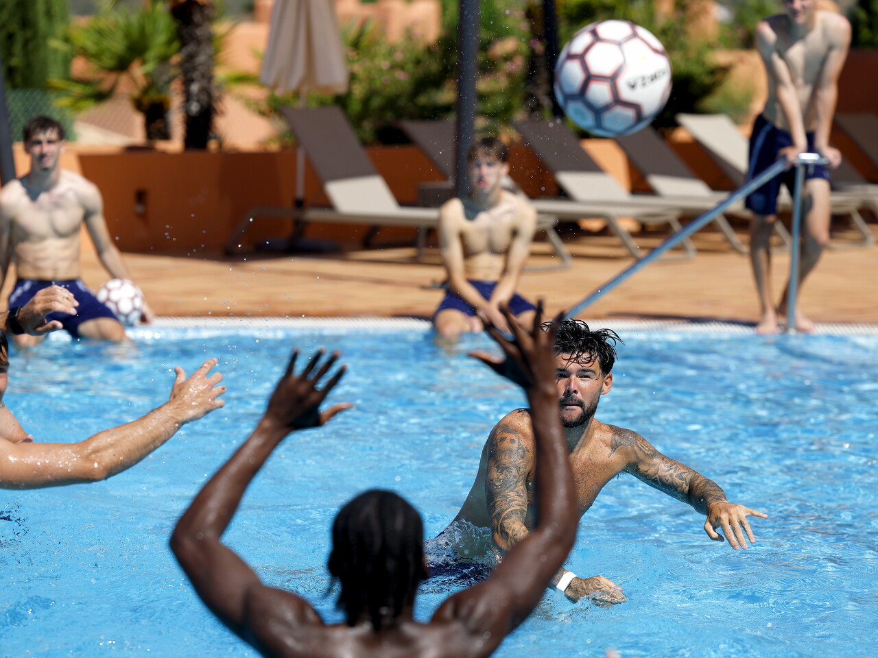 Several WBA players in the pool during a game