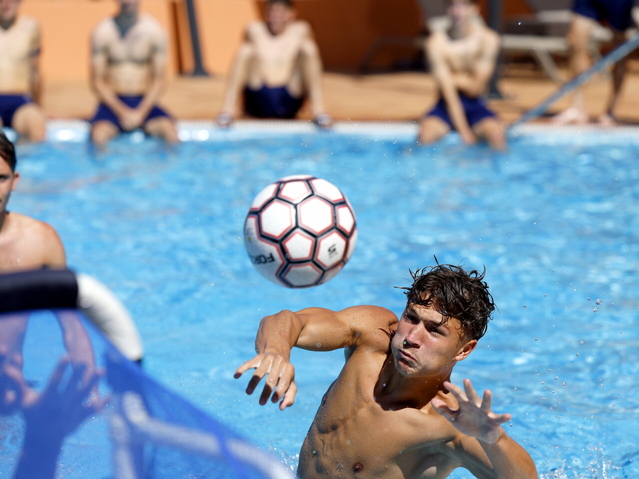 Several WBA players in the pool during a game