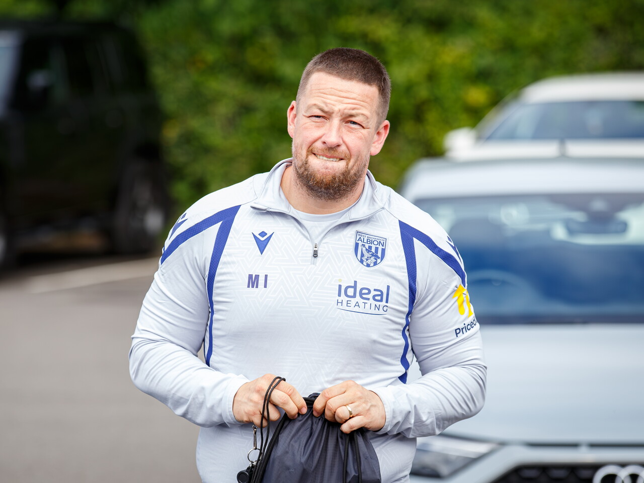 Martyn Irvine arriving at The Fitlife Foods Performance Centre and walking through the car park
