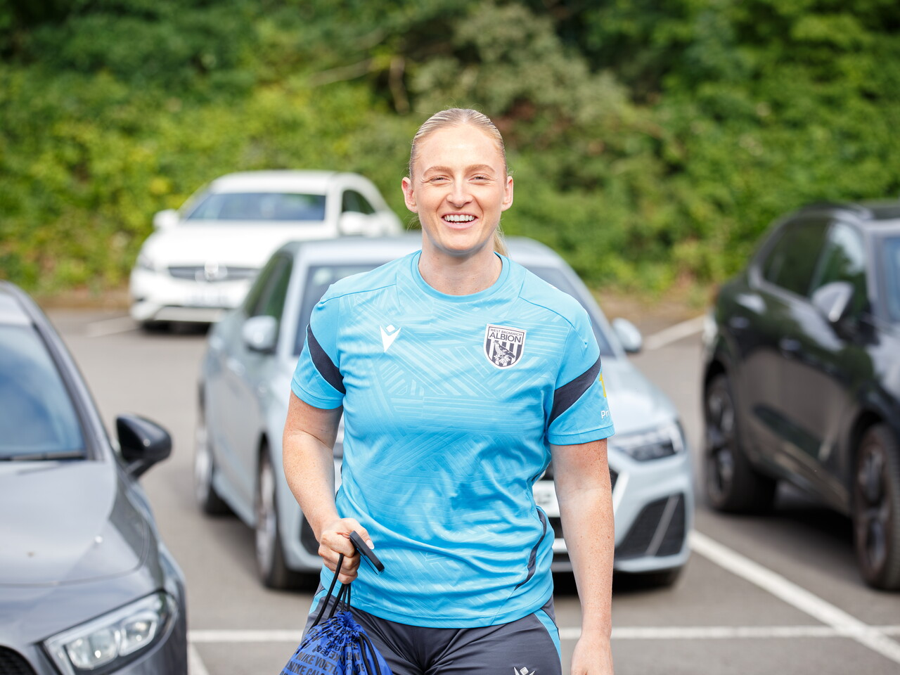 Zoe Creaney arriving at The Fitlife Foods Performance Centre and walking through the car park