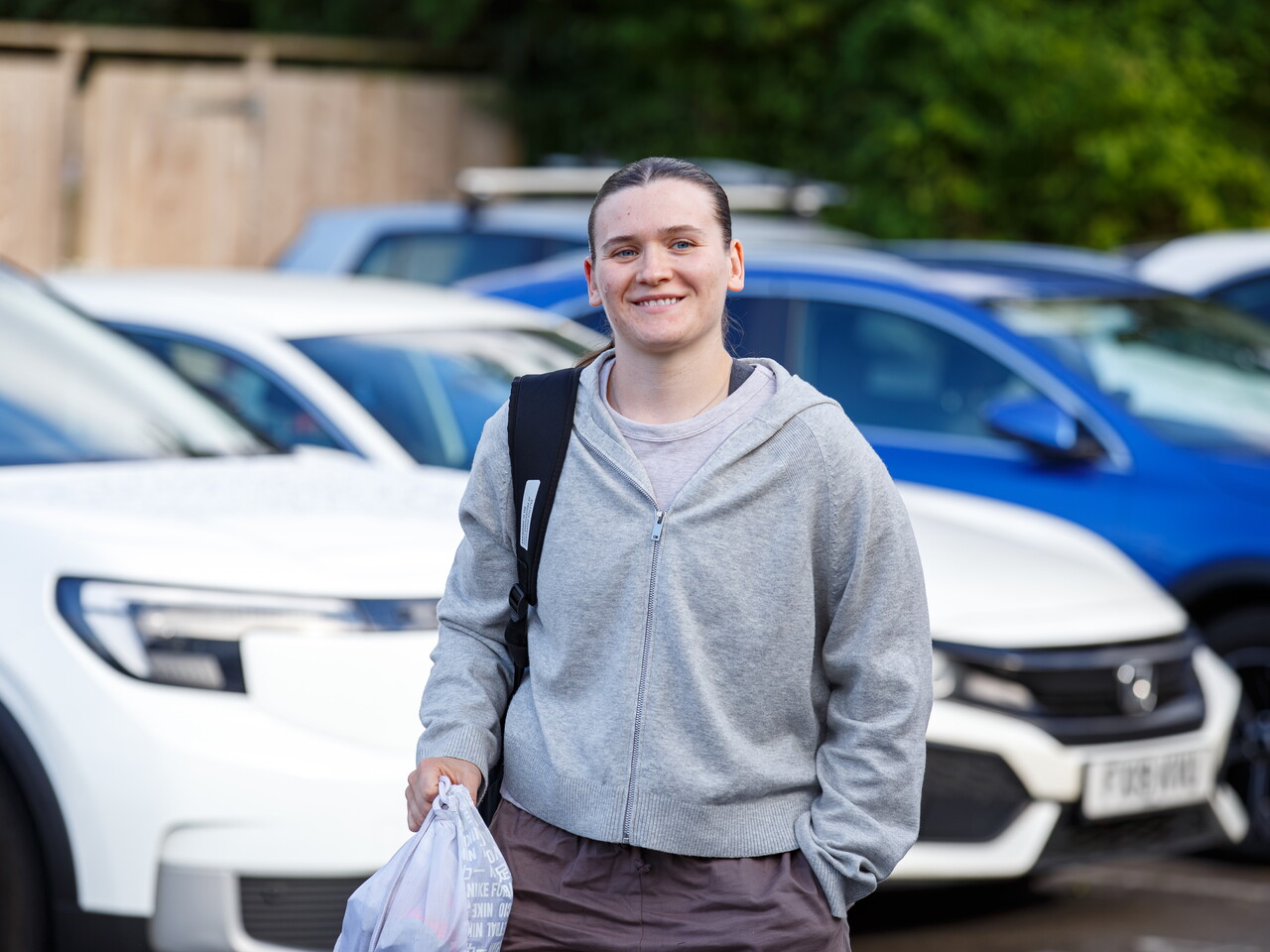 Charlotte Clarke arriving at The Fitlife Foods Performance Centre and walking through the car park