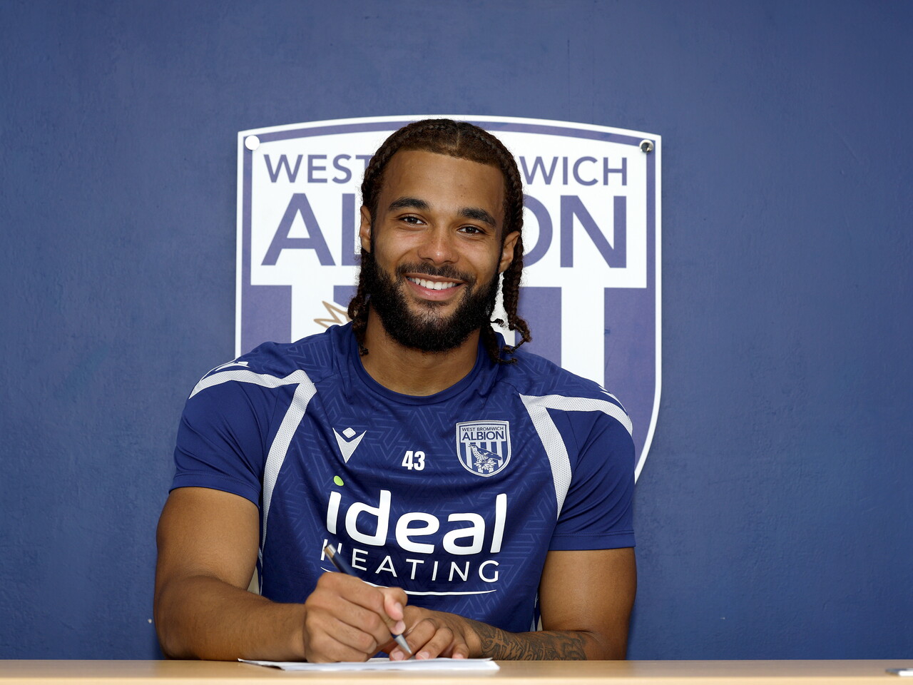 A photo of youngster Jamal Mohammed after signing a new deal