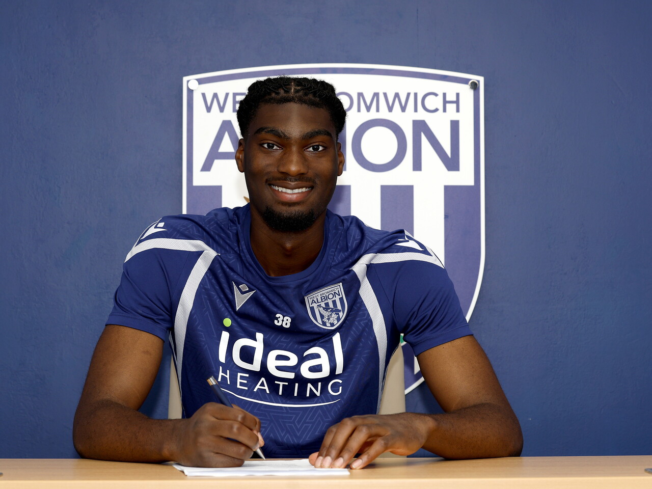 A photo of youngster Brian Okonkwo after signing a new deal