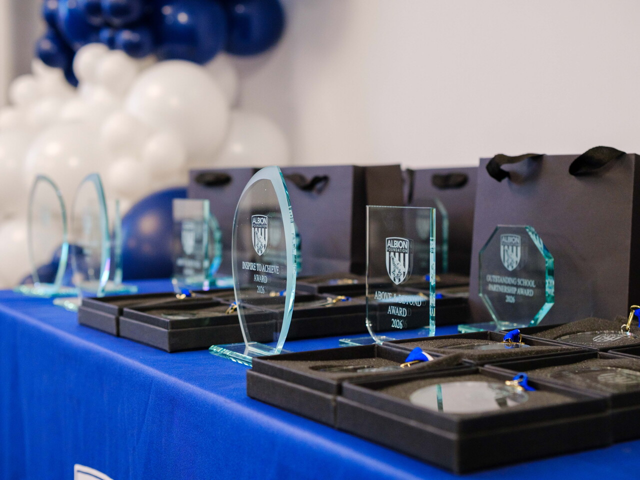 Glass awards trophies on a table