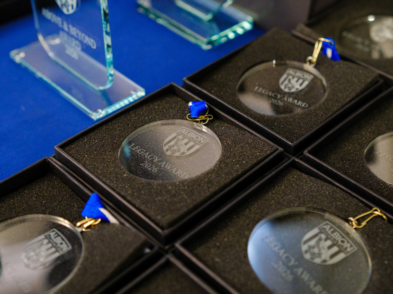 Close-up of Legacy Leader awards.