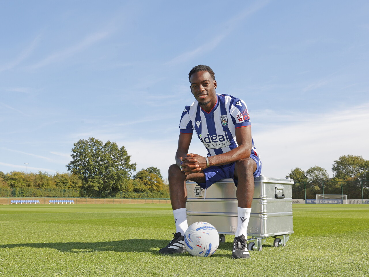 Rabby Nzingoula on the pitch wearing Albion's new home shirt