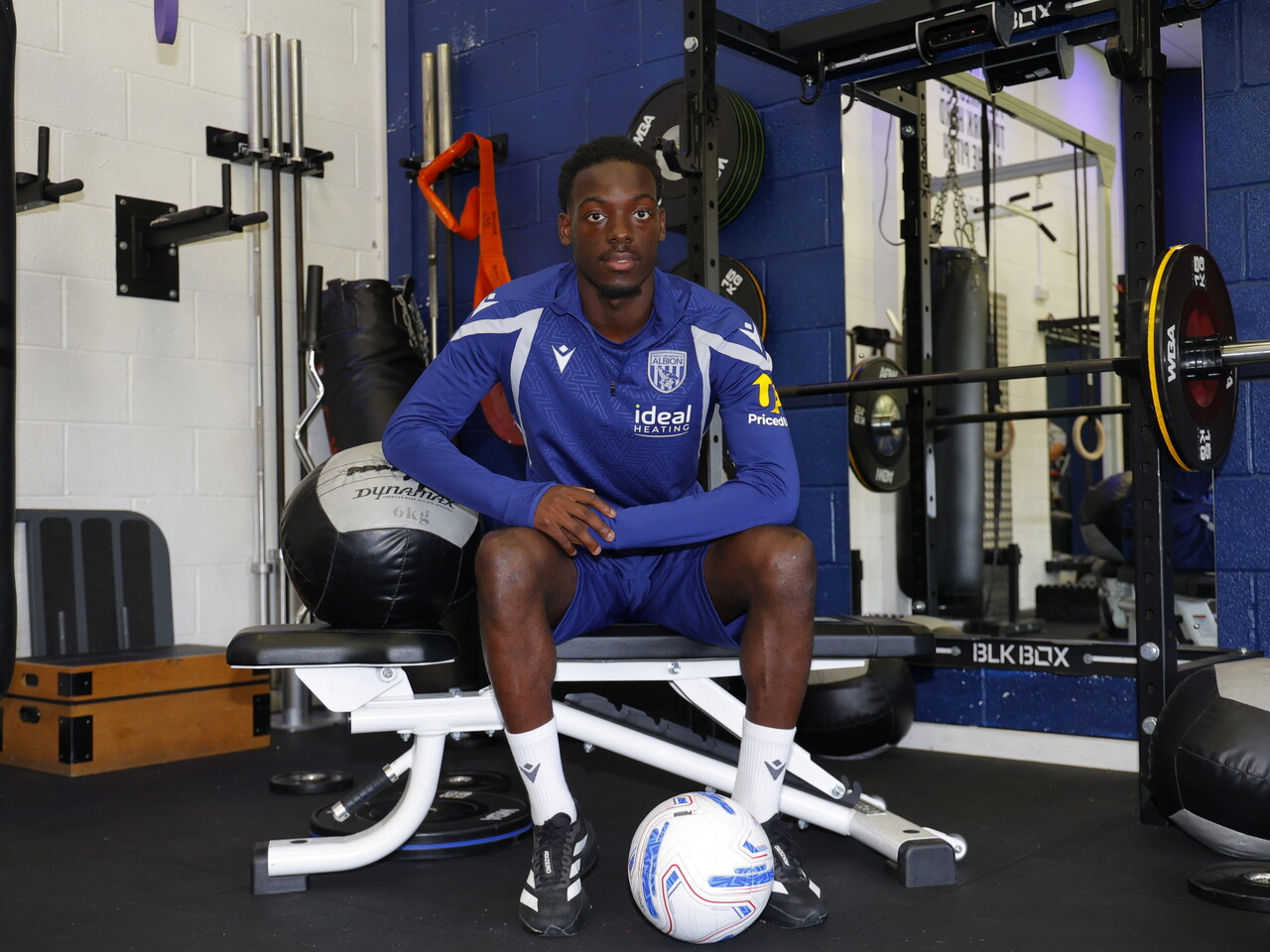 Rabby Nzingoula poses in the gym