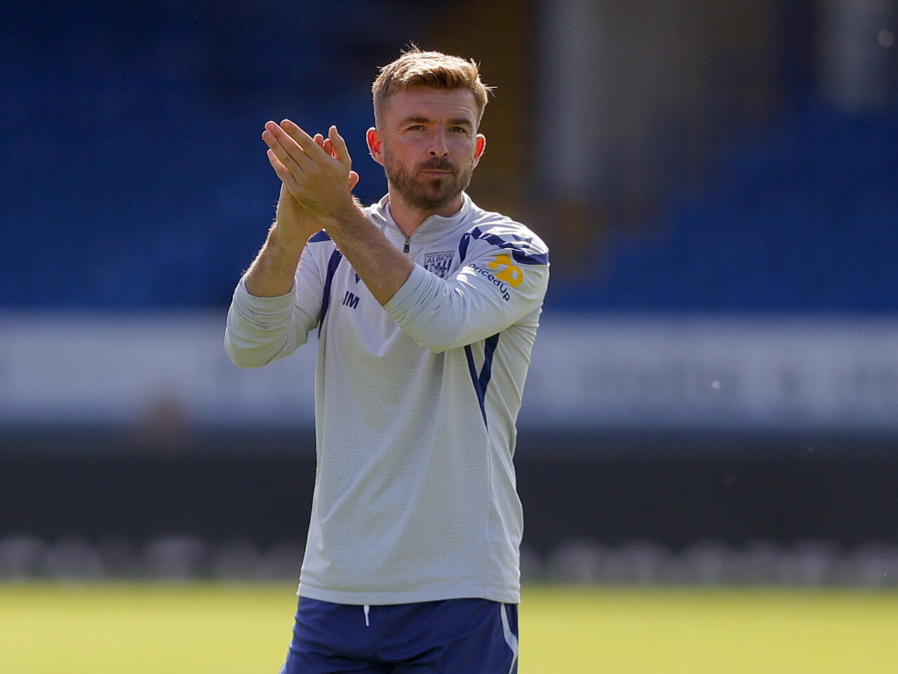 James Morrison applauding WBA fans at Peterborough