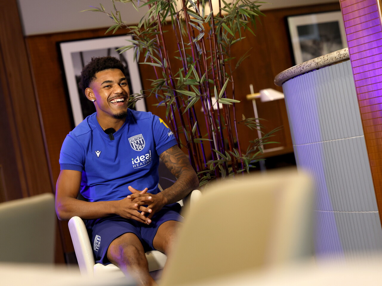 Kareem Tunde laughing while being interviewed by WBA TV