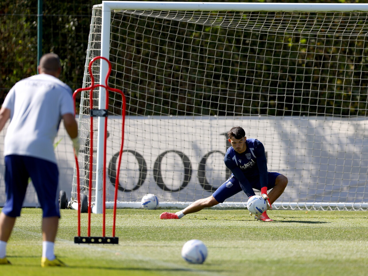 Max O'Leary making a save during a training session