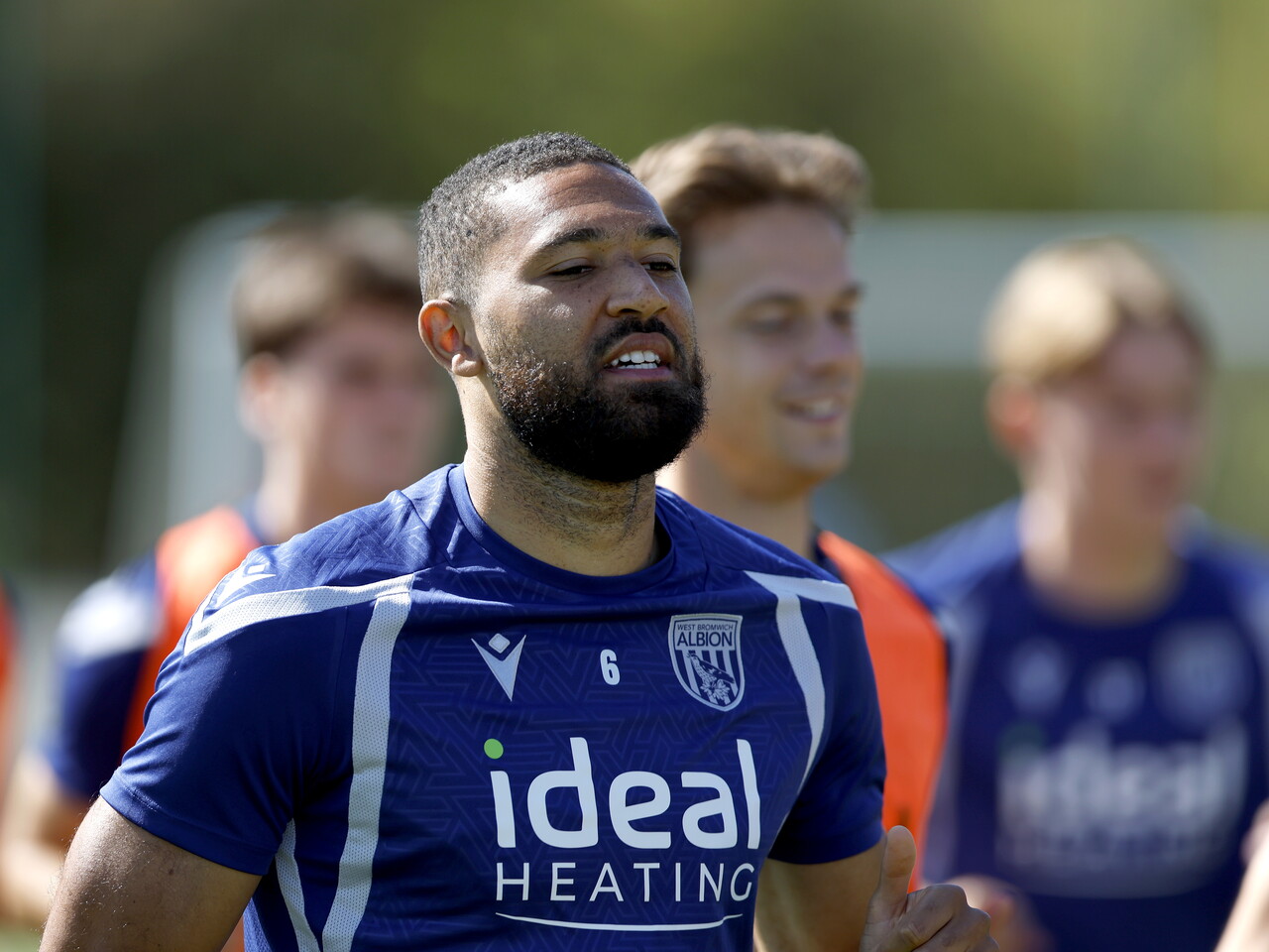 George Campbell running during a training session