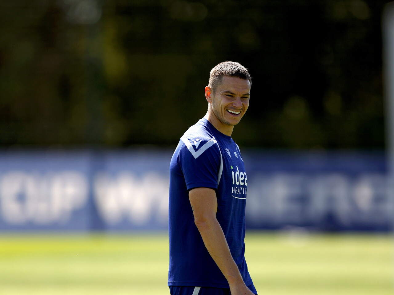 Conor Townsend smiling during a training session
