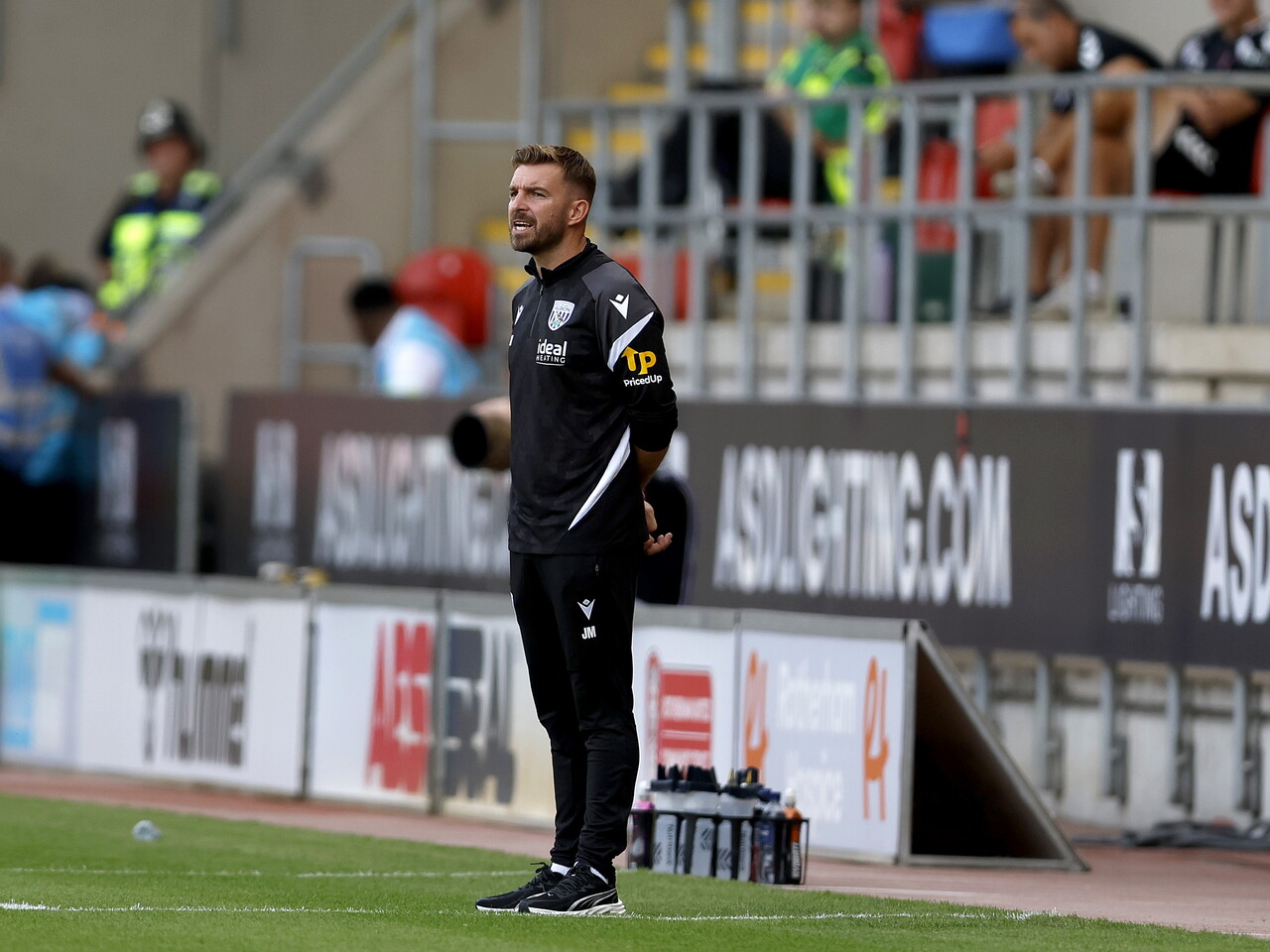 James Morrison on the touchline.
