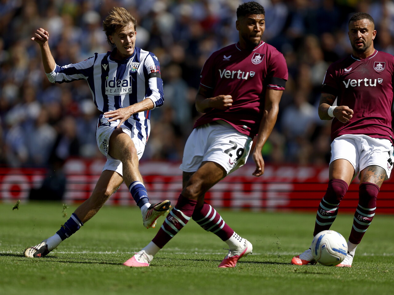 Isaac Price has a shot against Burnley