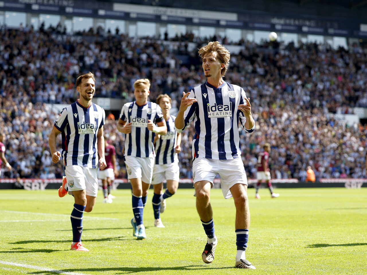 Isaac Price celebrates his penalty against Burnley