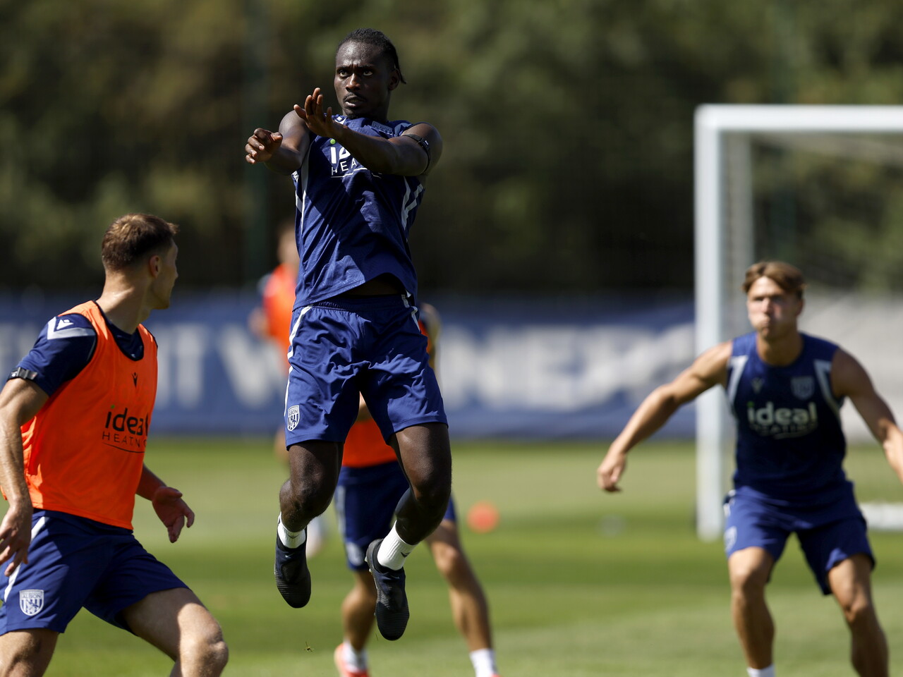 Ousmane Diakité jumping to win a header during a training session