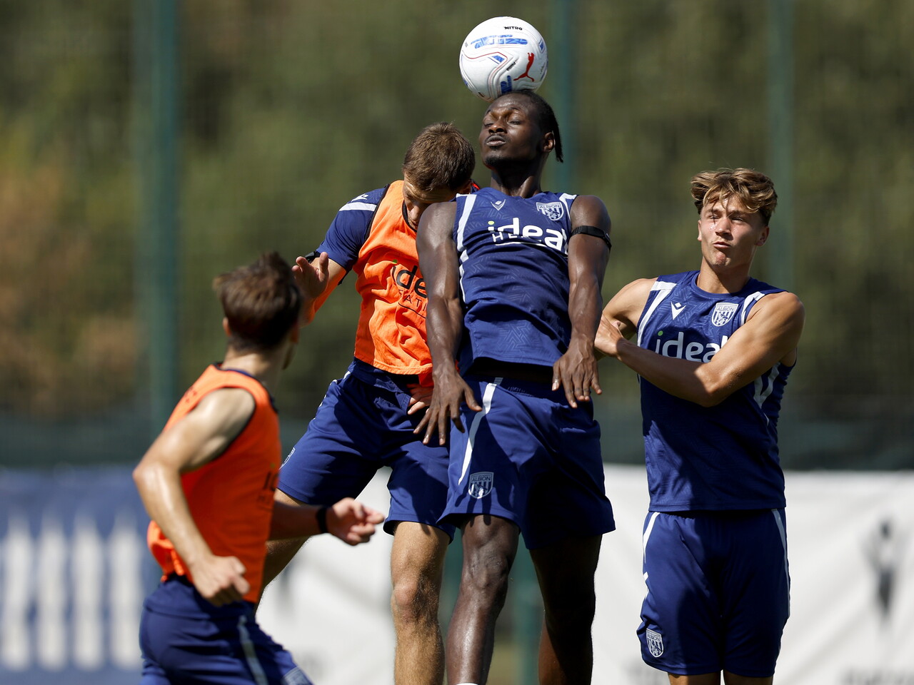 Ousmane Diakité jumping to win a header during a training session
