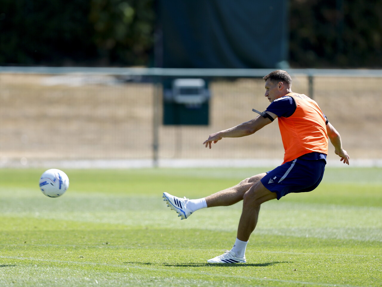 Krystian Bielik taking a shot during a training session