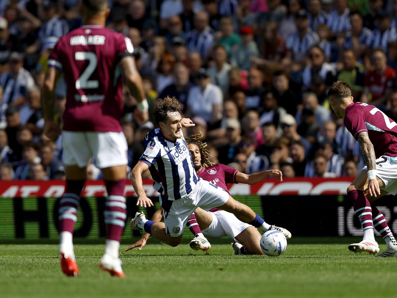 Callum Styles makes a tackle against Burnley